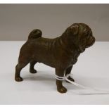 A bronze model of a pug. 8 cm wide.