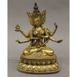 A gilt bronze deity. 17.5 cm high.