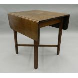 A late 19th/early 20th century mahogany twin flap table. 76 cm wide.