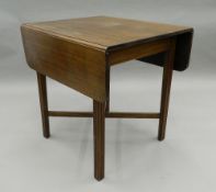 A late 19th/early 20th century mahogany twin flap table. 76 cm wide.