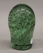 A glass dump weight. 12 cm high.