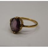 A 9 ct gold amethyst set ring. Ring size H/I (1.