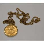 A 1915 gold sovereign in a 9 ct gold mount, on an unmarked chain (16.1 grammes total weight).