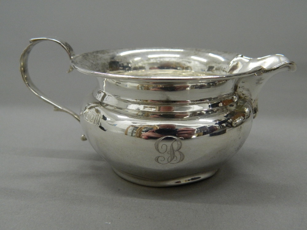 A silver four piece tea set. Coffee pot 18 cm high (25. - Image 8 of 9