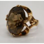 A 9 ct gold large smoky quartz ring.