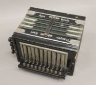 An Ajax Champion Band accordion. 26 cm wide.