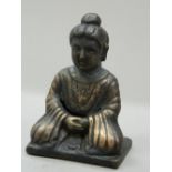 A small bronze seated Buddha. 7 cm high.