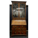 A Georgian mahogany bureau bookcase. 95 cm wide.