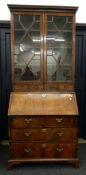 A Georgian mahogany bureau bookcase. 95 cm wide.