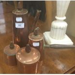 An Arts and Crafts copper coffee set. The largest 23 cm high.