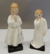 Two Royal Doulton figurines, Bedtime and Darling. The former 15 cm high.