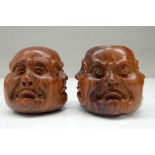 Two wooden four faced Buddha heads. 4.5 cm high.
