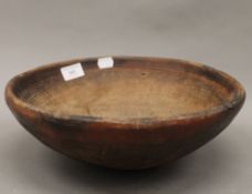 A tribal pottery bowl. 32 cm diameter.