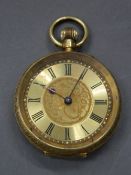 An 18 ct gold fob watch. 3.2 cm diameter (29.