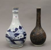 Two Oriental porcelain vases. The largest 23.5 cm high.