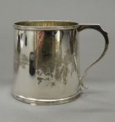 A silver Christening mug. 7 cm high (4.