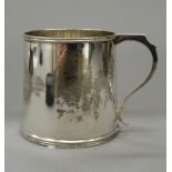 A silver Christening mug. 7 cm high (4.