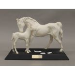 A Beswick horse group,