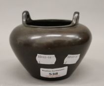 A bronze censer. 9.5 cm high.