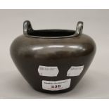 A bronze censer. 9.5 cm high.