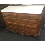 A 19th century Continental chest of drawers with a marble top. 117 cm wide, 85 cm high, 50.