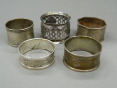 Five silver napkin rings. Largest 4.5 cm diameter (78 grammes).