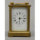 A miniature carriage clock. 8 cm high.