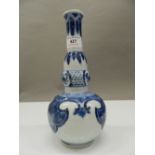 A Chinese blue and white porcelain vase of gourd form. 24 cm high.
