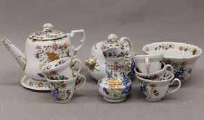 A quantity of Masons Ironstone teawares. The teapot 25 cm wide.