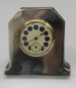 A silver and wood desk clock, with a blue and white enamelled dial, hallmarked Birmingham 1913. 8.