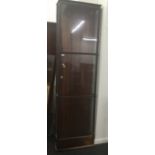 A large 19th century shop display cabinet. 236 cm high x 67 cm wide x 23 cm deep.