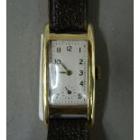 A gentleman's Art Deco 9 ct gold wristwatch. 2 cm wide (22.