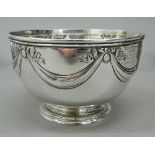 A silver presentation bowl. 15.75 cm diameter; 9.
