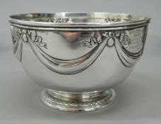 A silver presentation bowl. 15.75 cm diameter; 9.