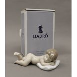 A Lladro porcelain figure, Sleepy Time No.06497, in original box. 13.5 cm long.