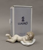 A Lladro porcelain figure, Sleepy Time No.06497, in original box. 13.5 cm long.