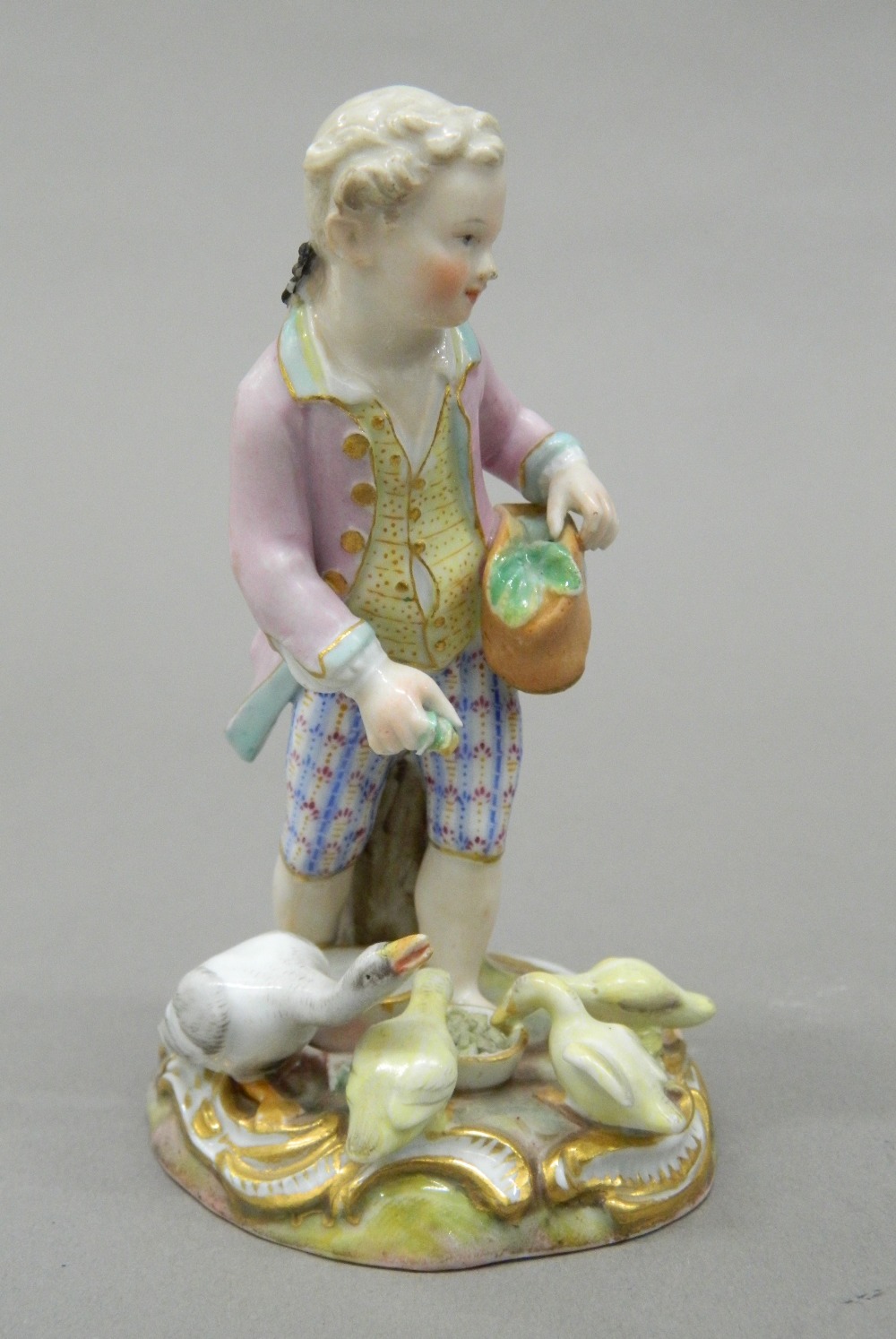 A pair of 19th century Meissen porcelain figurines, one formed as a young boy feeding geese, - Bild 3 aus 6