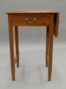 An early 20th century side table with single flap. 50.5 cm wide (flap down).