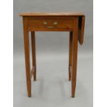 An early 20th century side table with single flap. 50.5 cm wide (flap down).