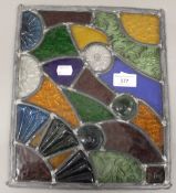 A leaded stained glass panel. 30.5 cm high.