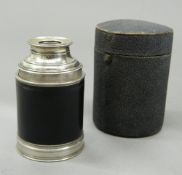 A small 19th century cased telescope, inscribed RAMSDEN, LONDON. Case 8 cm high.