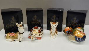 Four boxed Royal Crown Derby paperweights (all with stoppers), including Donkey Foal,