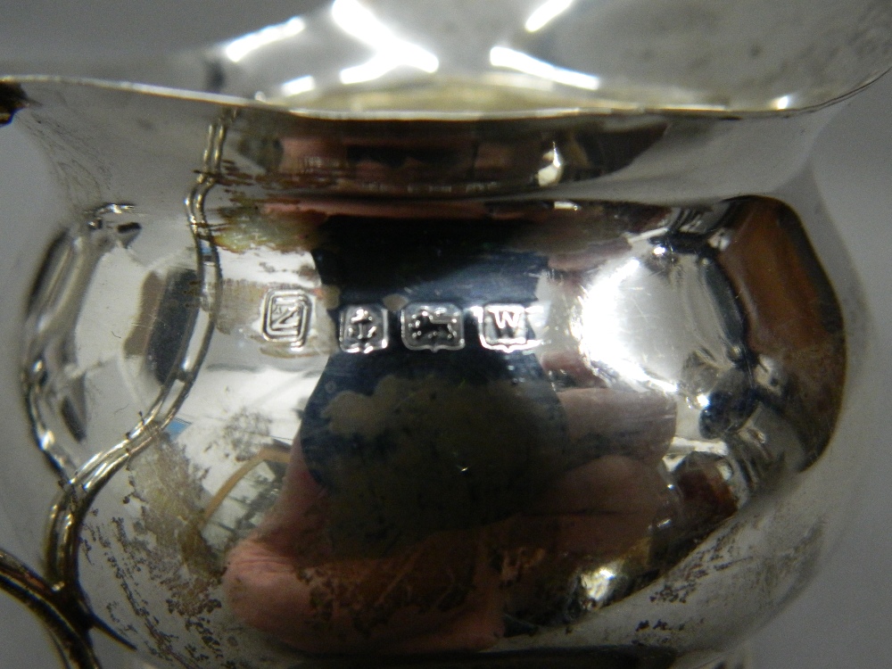 A silver cream jug, a mustard, a mug and spoons (7. - Image 3 of 9