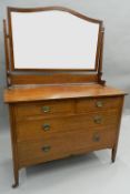 An Edwardian mahogany dressing table. 107 cm wide.