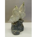 A pair of Doulton Lambeth parakeets. 19 cm high.