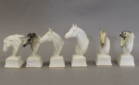 Six Royal Worcester porcelain racehorse busts. The largest 14 cm high.