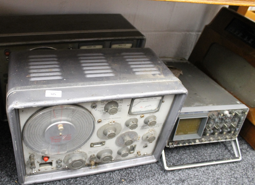 Three various radio Ham machines. The largest 57 cm wide.