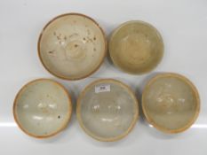 Five Chinese Song type bowls. The largest 16.5 cm diameter.