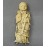 A 19th century Japanese ivory okimono. 8 cm high.