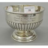 A silver pedestal bowl. 12 cm wide; 9 cm high (6.